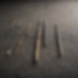 A selection of acupuncture needles of varying sizes displayed on a textured surface